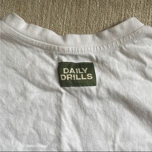 M Daily Drills Tucker Tee